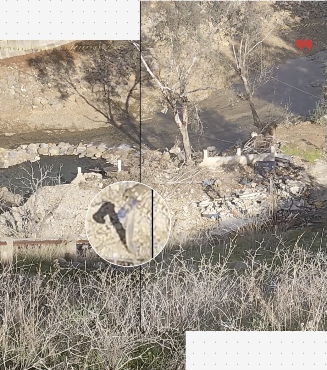 Image of pump remnants and a destroyed building